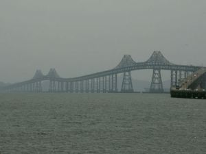 Description: Water flows toward the Richmond-San Rafael Bridge from San Pablo Bay (CBS)